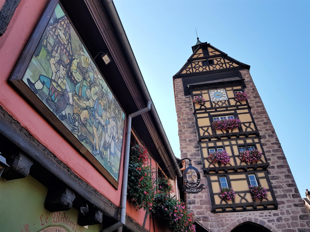 Pretty clock tower in Riquewihr on the Route du Vin in Alsace