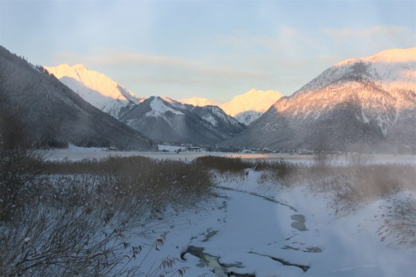 Lake Achensee with the snow-covered Austrian alps in the background taken in the town of Maurach