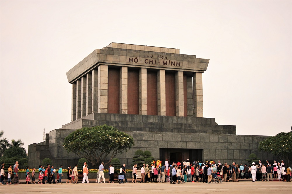 An enormous queue of people lining up to go inside the enormous mausoleum for Ho Chi Minh in Hanoi