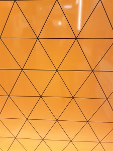 Yellow tiles with a triangle pattern at the Design Museum in London