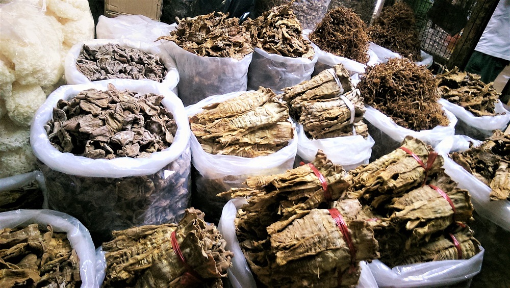 Sacks of dried fish on sale in a market in Hanoi