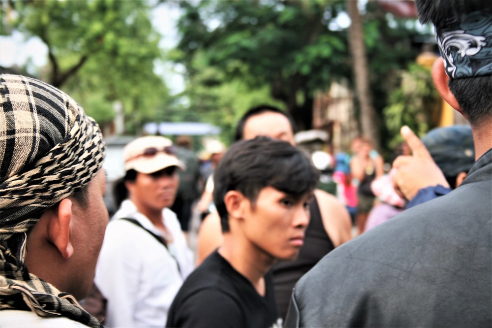 An actor filming an action scene in Hoi An