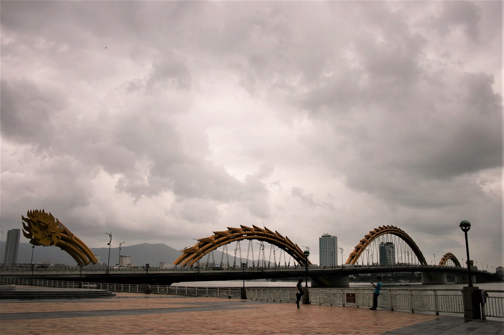 The golden Dragon Bridge spanning the Han River in Danang