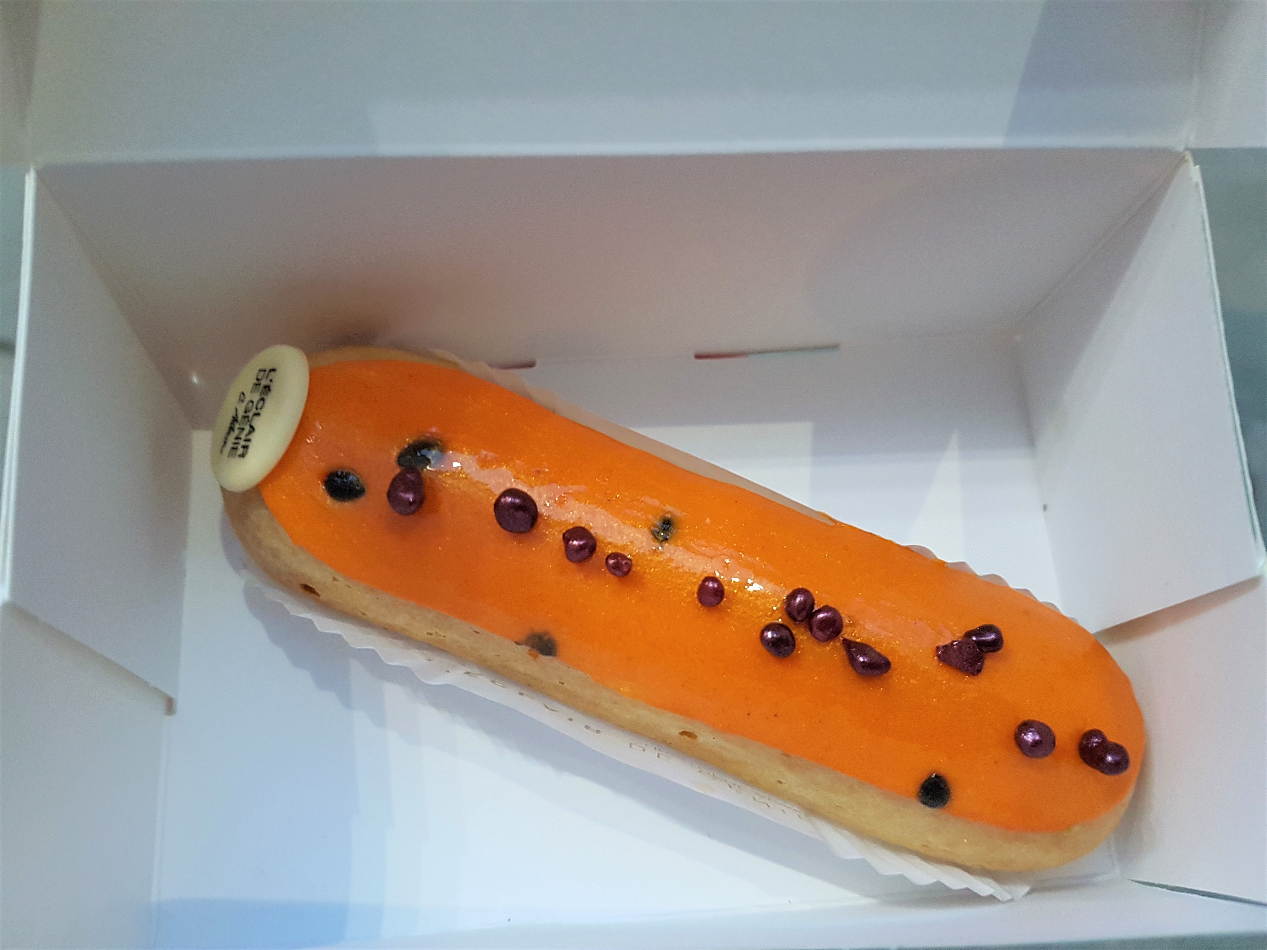 Passion fruit and raspberry eclair