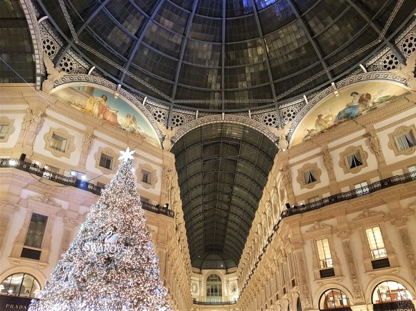 Galleria Vittorio Emanuele II shopping arcade in Milan at night with a Swarovski Christmas tree