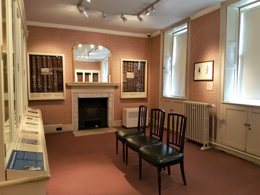 The room filled with collections of buckles, jewellery and miniatures
