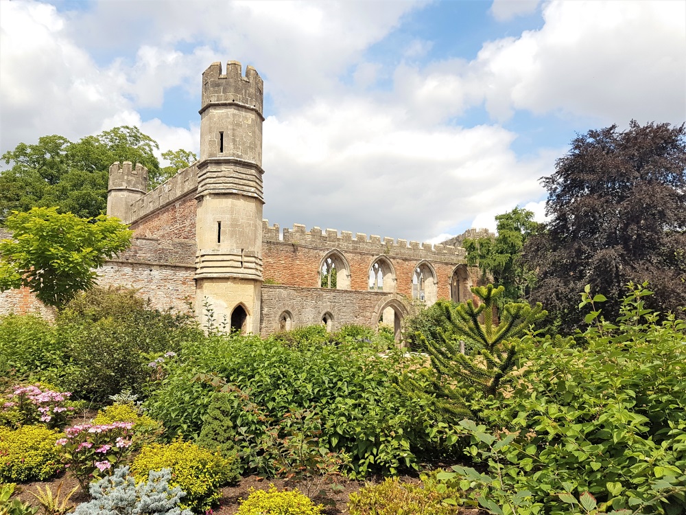 The ruins of the great hall and the surrounding gardens at the Bishop's Palace in Wells