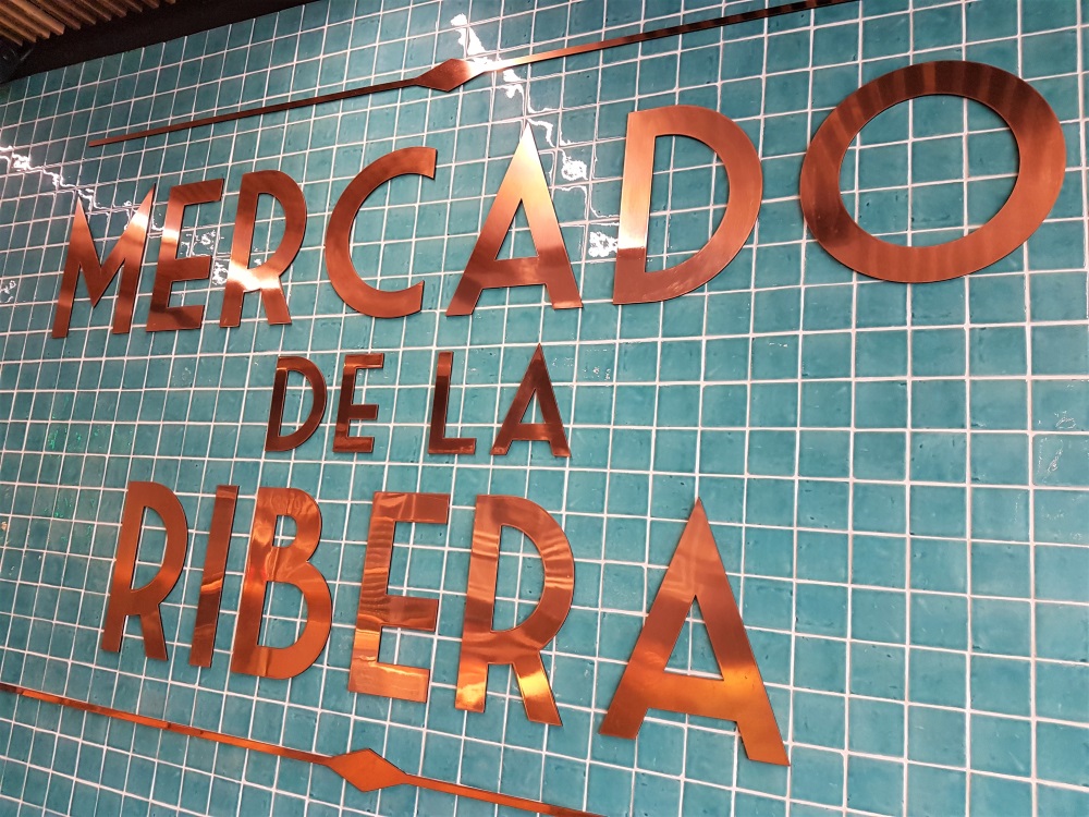 A sign inside the Mercado de la Ribera in Bilbao