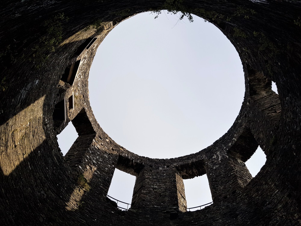 Looking up at the sky inside the round tower at Dinefwr Castle