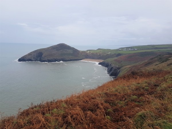 The sandy cove of Mwnt in the distance, spied from the Ceredigion coastal path