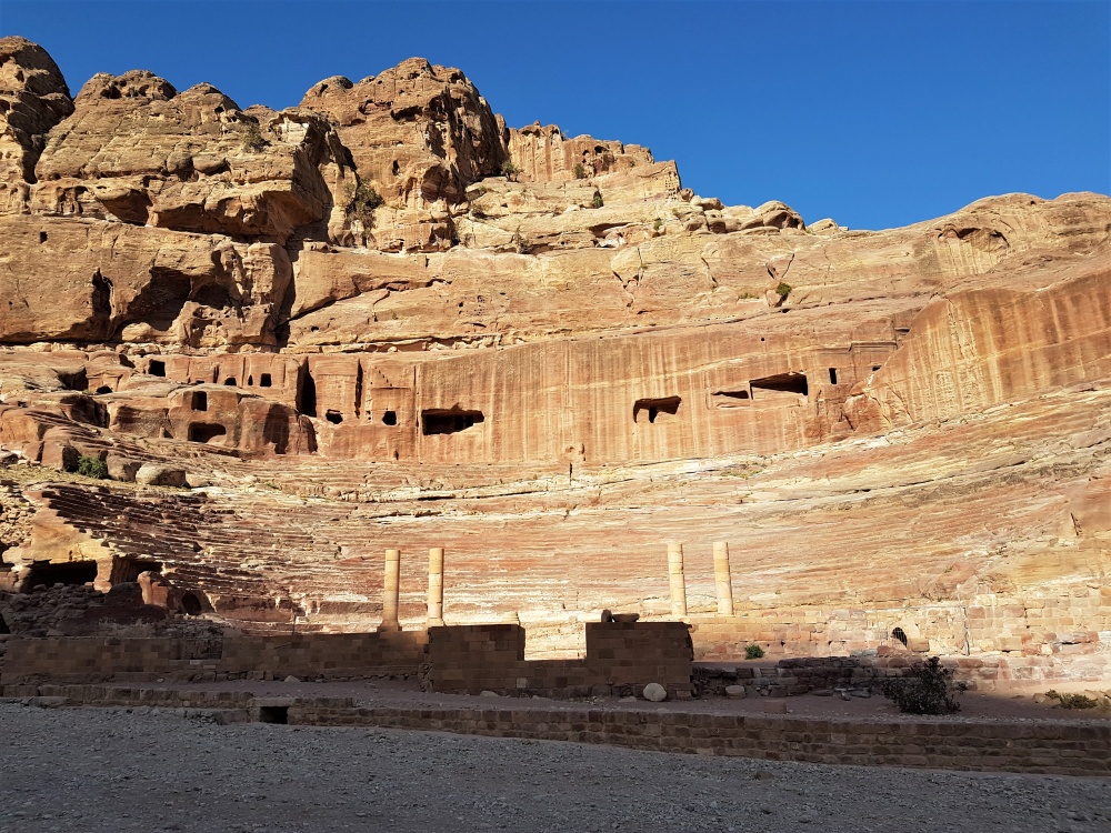 The rose-red amphitheatre cut into the rock at Petra