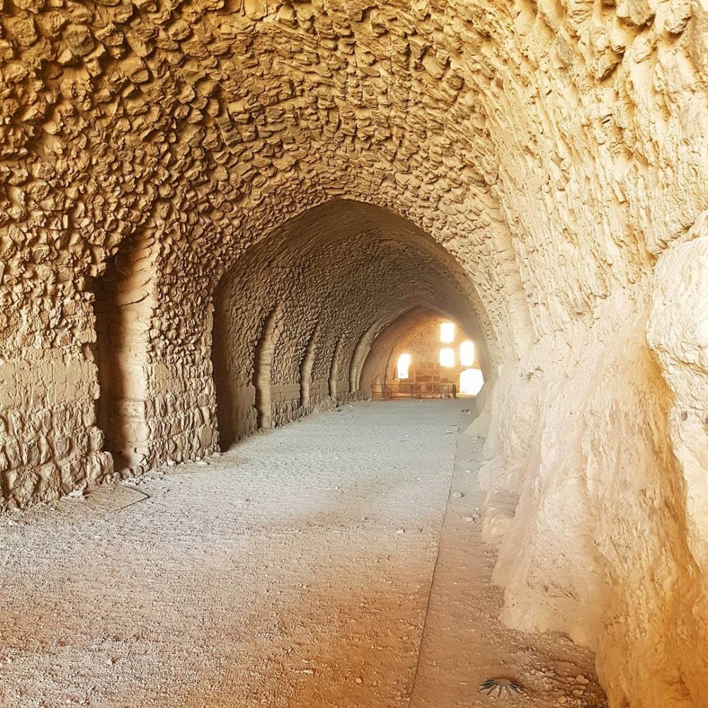 Dusty white limestone passageway inside Kerak Castle