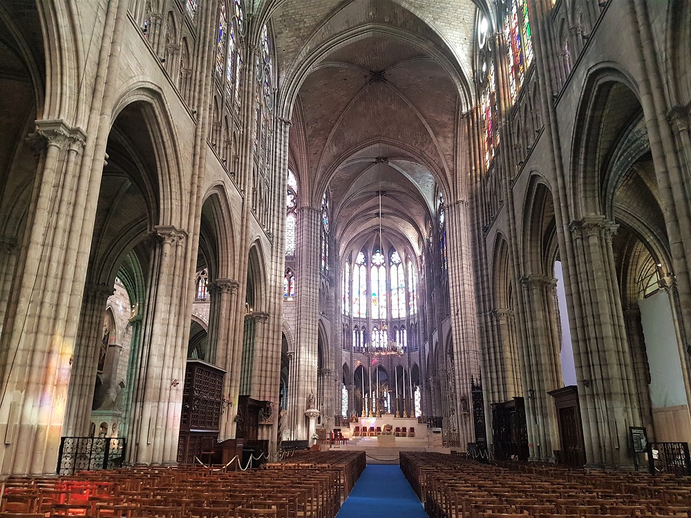 Inside the Gothic nave of the Basilica of Saint-Denis in Paris