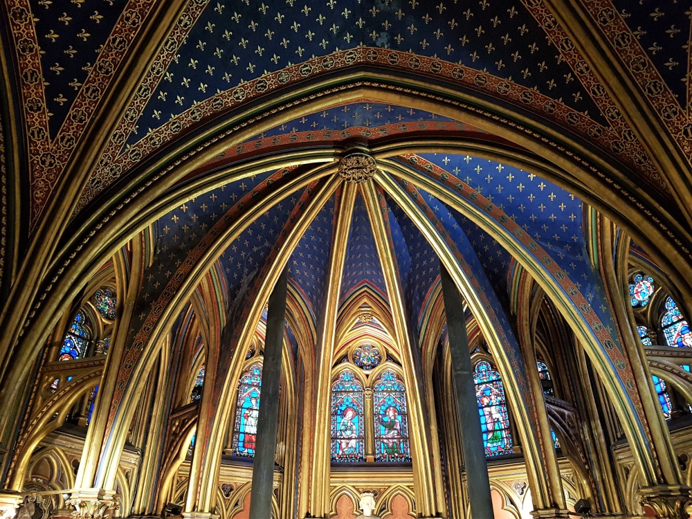 The dark blue and gold fleur-de-lys ceiling in the Lower Chapel at Sainte-Chapelle