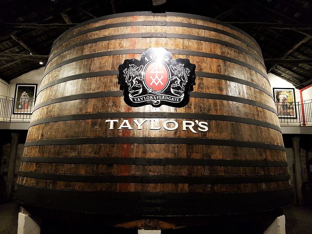 A giant barrel of port inside Taylor's port house in Porto