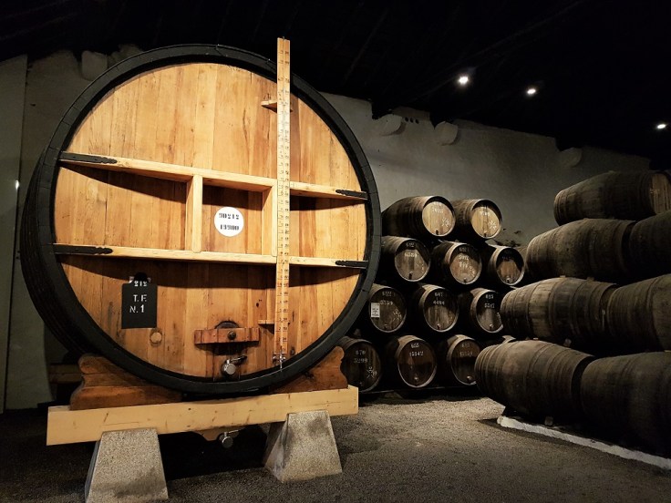 A large barrel of port inside Taylor's port house in Porto