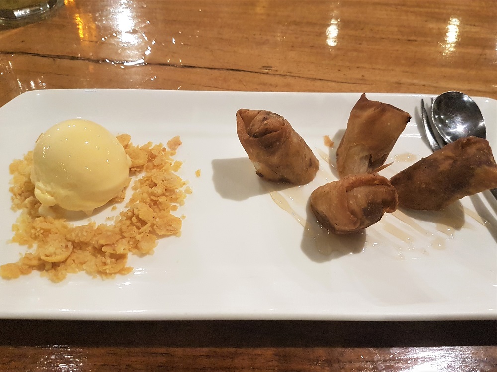 Banana fritters served with ice cream from a restaurant in Sepilok, Borneo