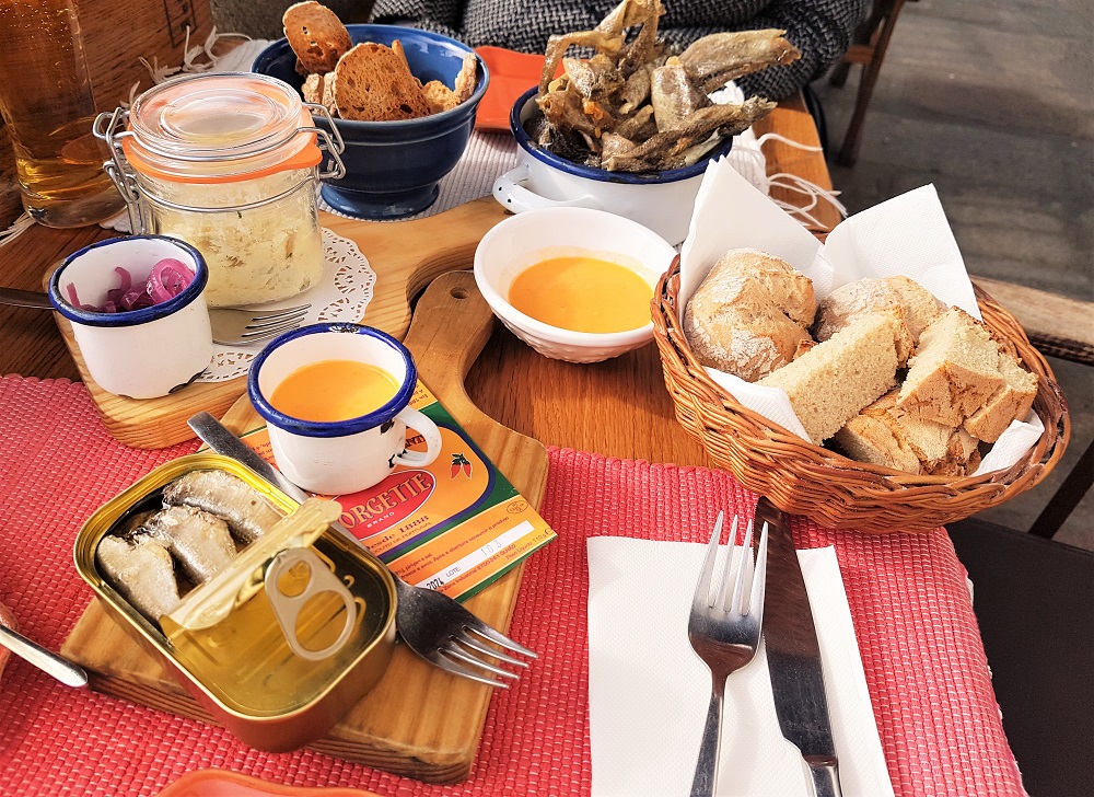 Lunch of canned sardines, cod pate and cod chips at Bacalhau restaurant in Porto