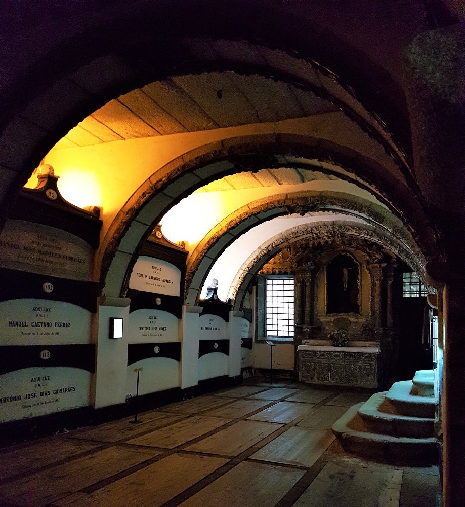 Tombs line the walls of the crypt at the Igreja de Sao Francisco in the Ribeira district of Porto