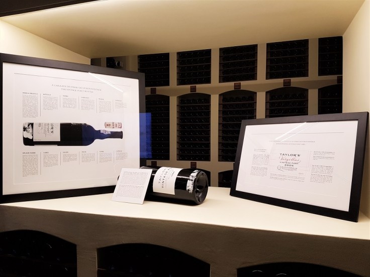 Bottles of port on display in the museum at Taylor's port house in Porto