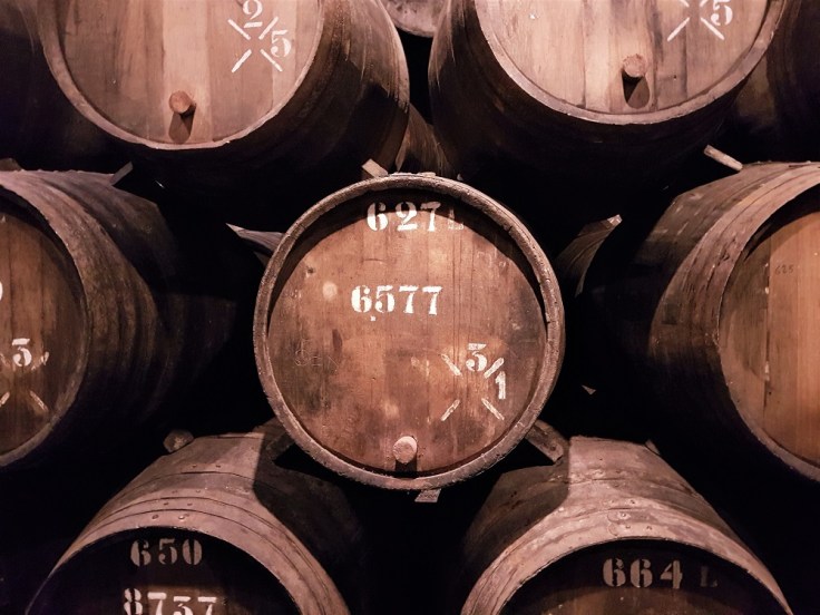 Barrels of port in the cask room at Taylor's port house in Porto