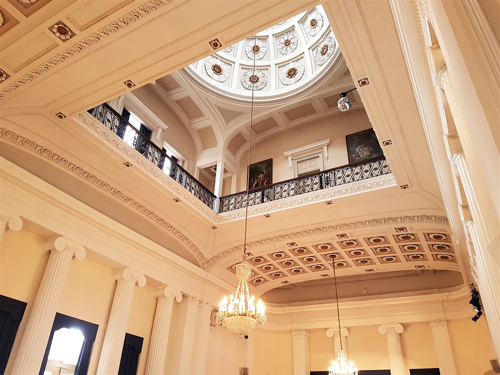 The grand ceiling inside the Pittville Pump Room in Cheltenham